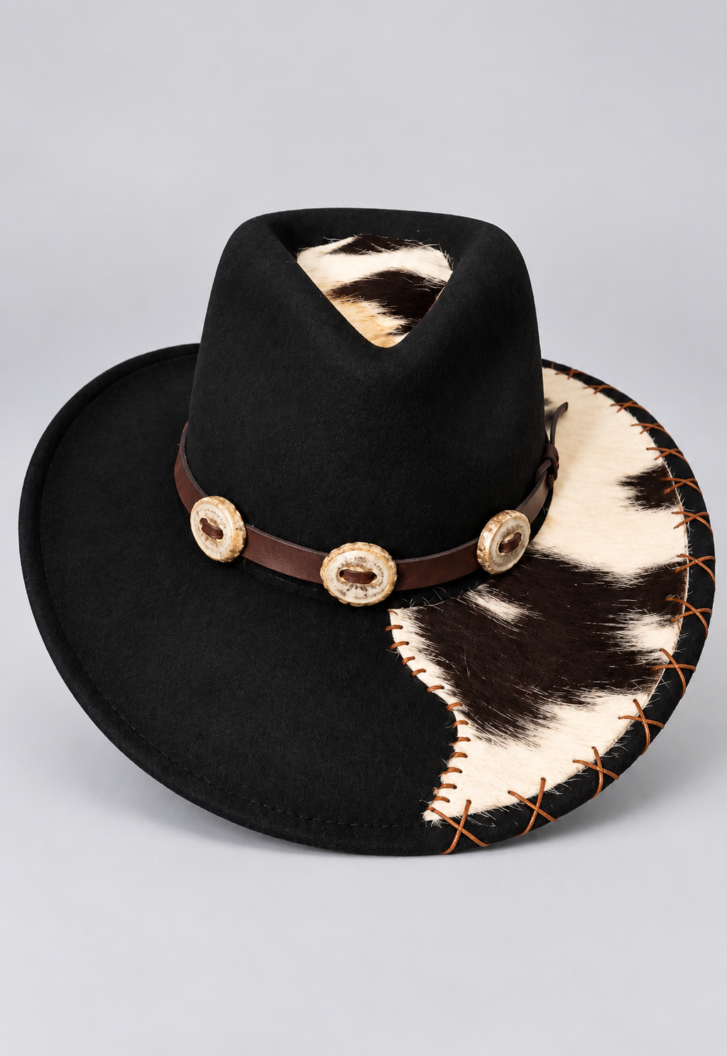 Black 100% wool Scala western cowboy hat with hand-sewn cowhide brim, brown leather band and deer horn buttons