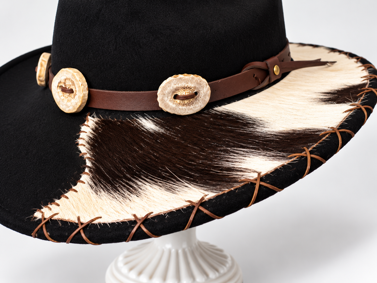 Black Scala 100% wool western cowboy hat with hand-sewn cowhide brim, brown leather band, deer horn buttons and brown stitching