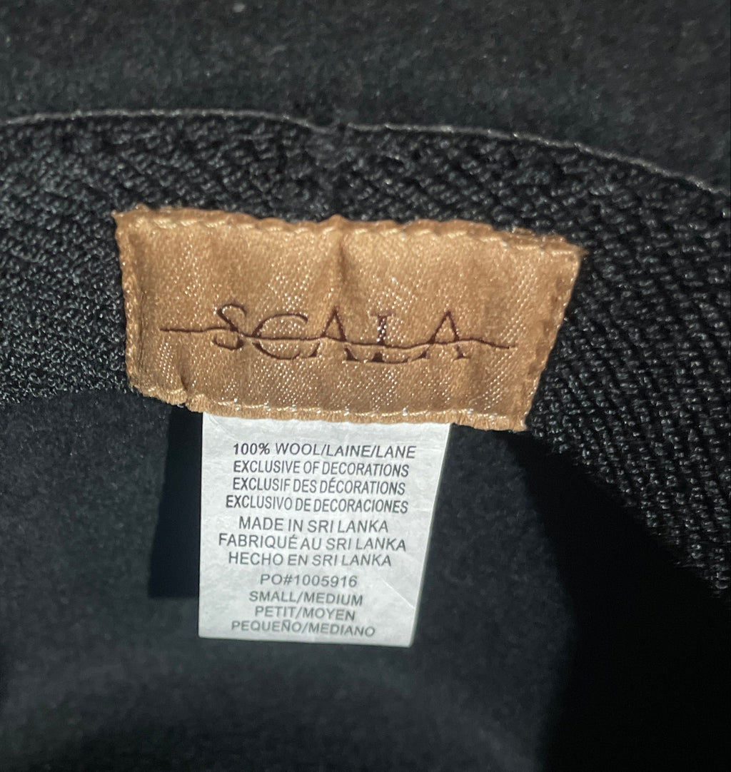 Inside view of black Scala 100% wool western hat showing Scala brand label and interior care tag